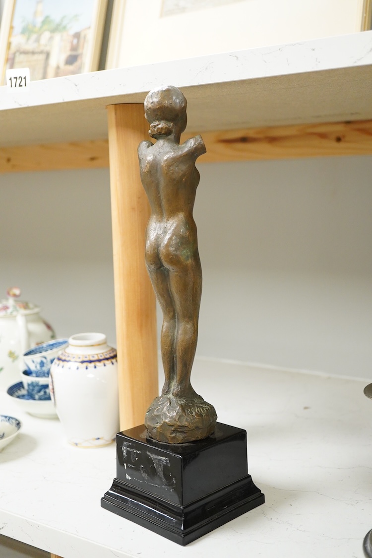 R. Schmitz, a German bronze study of a lady, raised on stepped base, 35cm high